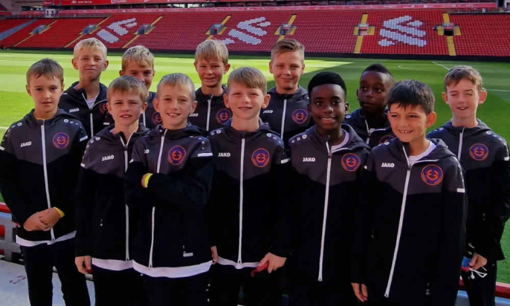 Group-Picture-Anfield-824x1030 1