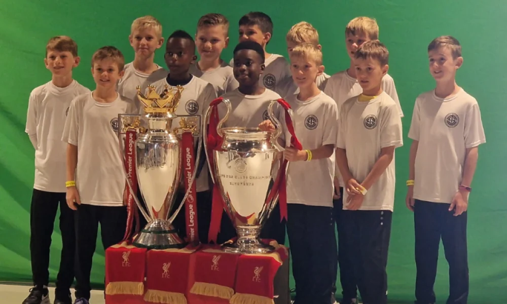 Group-picture-with-trophies-824x1030 1