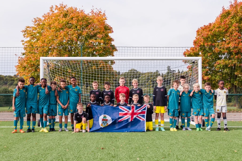 Wolverhampton-Wanderers-Academy-U11-vs-Total-Soccer-Cayman-Islands-U11-group-picture-1030x687 1
